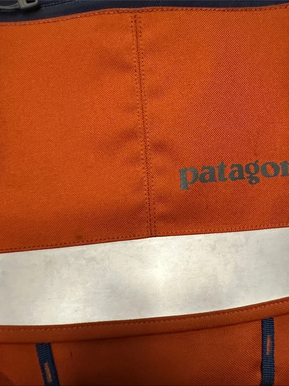 Patagonia Orange Men’s Messenger Bag with Reflective Accent